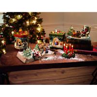 Villeroy & Boch Christmas Toys Santa auf Sessel